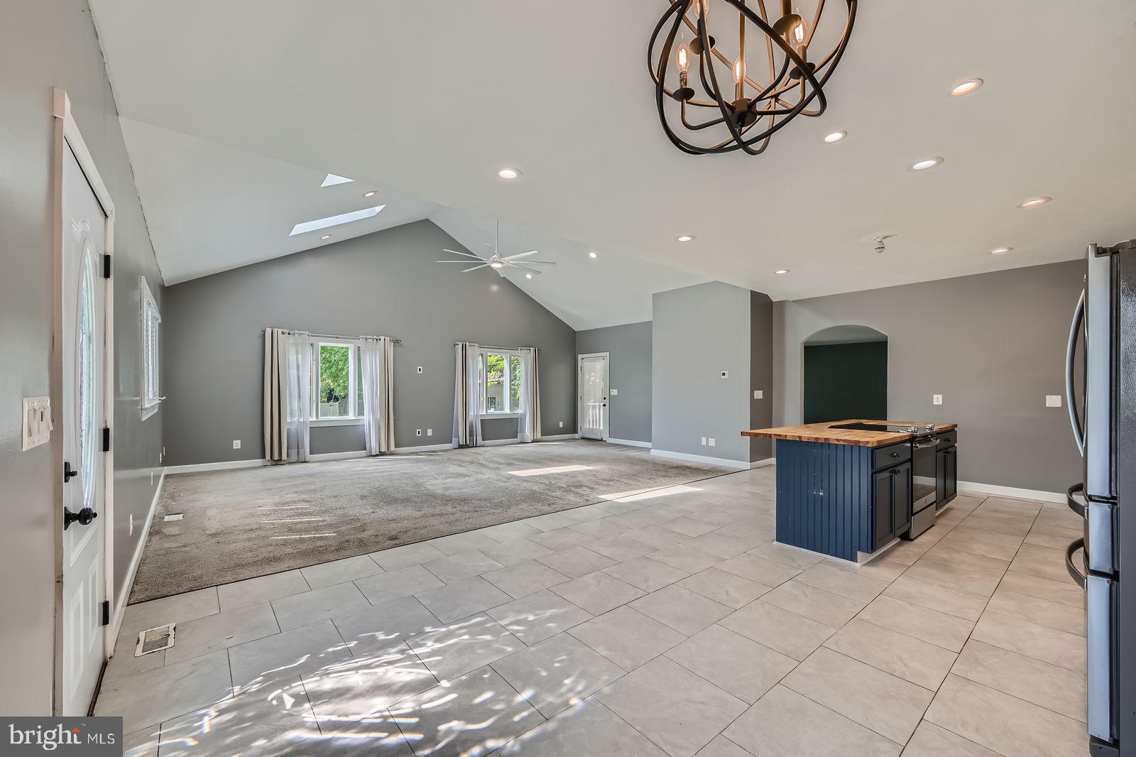 302 Haskell Drive Arnold, MD 21012 - Photo 25 of 31 a living room with furniture and a flat screen tv