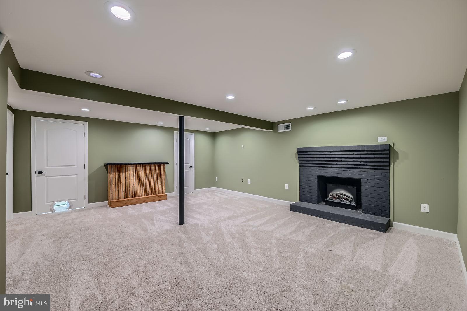 302 Haskell Drive Arnold, MD 21012 - Photo 30 of 31 a view of an empty room with a fireplace