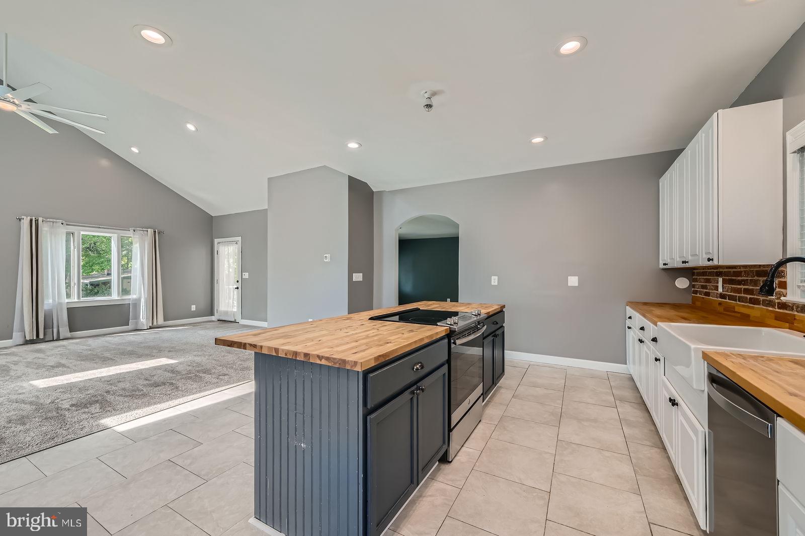 302 Haskell Drive Arnold, MD 21012 - Photo 6 of 31 a large kitchen with stainless steel appliances granite countertop plenty of counter top and sink