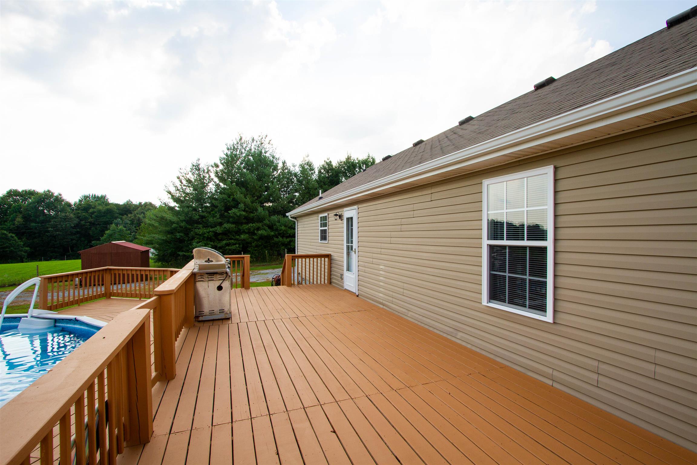 2065 Friendship Road Cross Plains, TN 37049 - Photo 25 of 30 Huge deck across back of house!