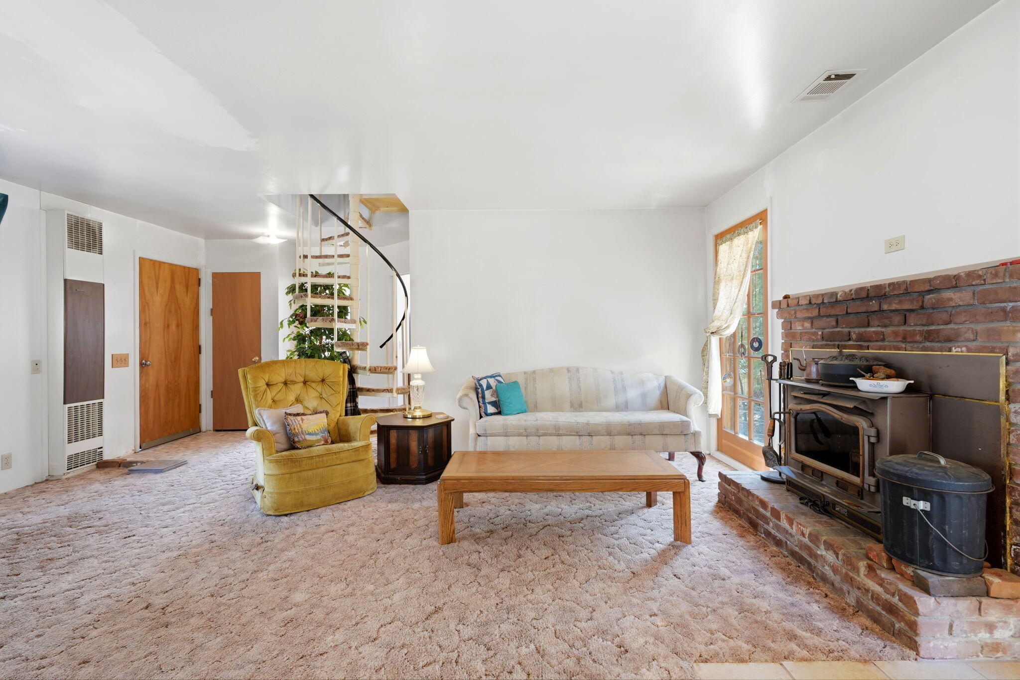 697 Loop Drive Springville, CA 93265 - Photo 11 of 55 a living room with furniture and a fireplace