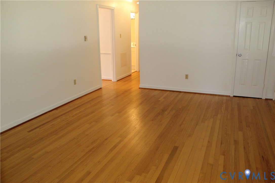 16524 Benmore Road Moseley, VA 23120 - Photo 24 of 43 a view of an empty room with wooden floor