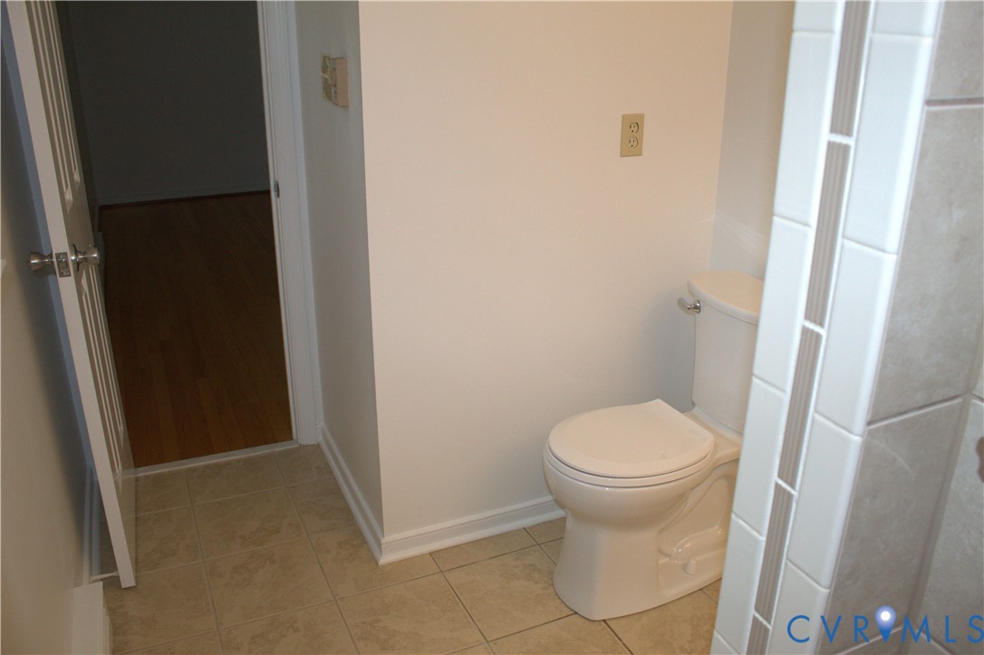 16524 Benmore Road Moseley, VA 23120 - Photo 33 of 43 a white toilet sitting next to a white sink