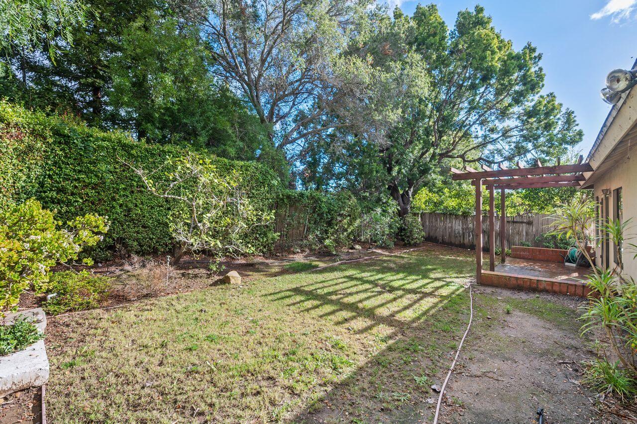 438 Seaview Road Montecito, CA 93108 - Photo 3 of 5 a view of a backyard with wooden fence