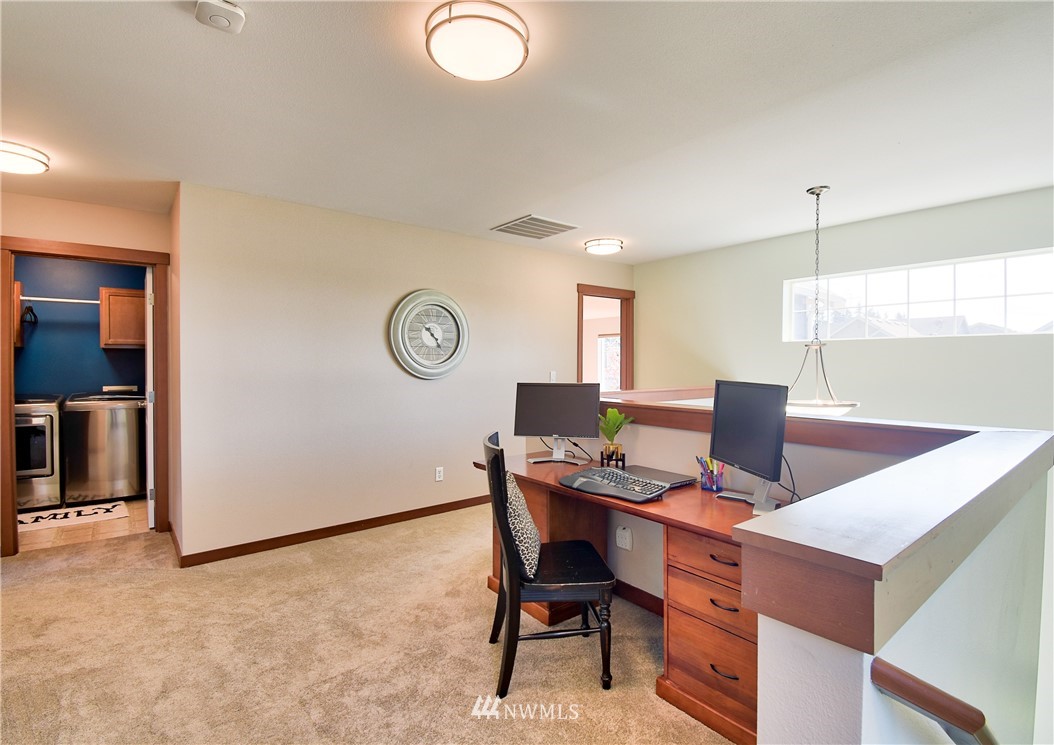 4209 164th Place Southeast Bothell, WA 98012 - Photo 22 of 25 a view of a workspace with furniture