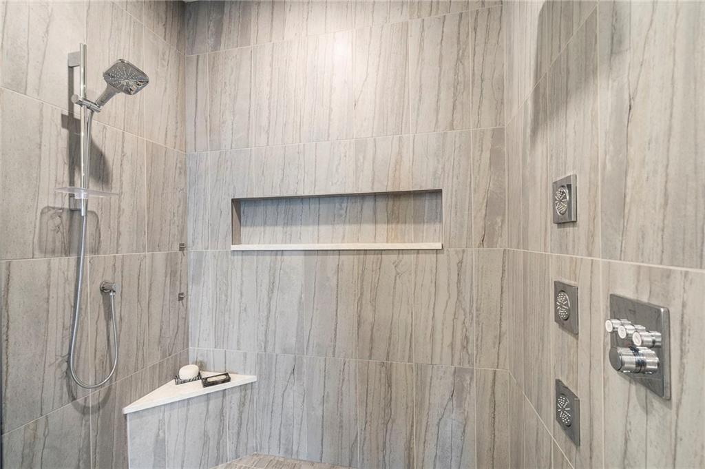 2520 Peachtree Road West, Unit 1203 Atlanta, GA 30305 - Photo 30 of 65 a bathroom with a shower