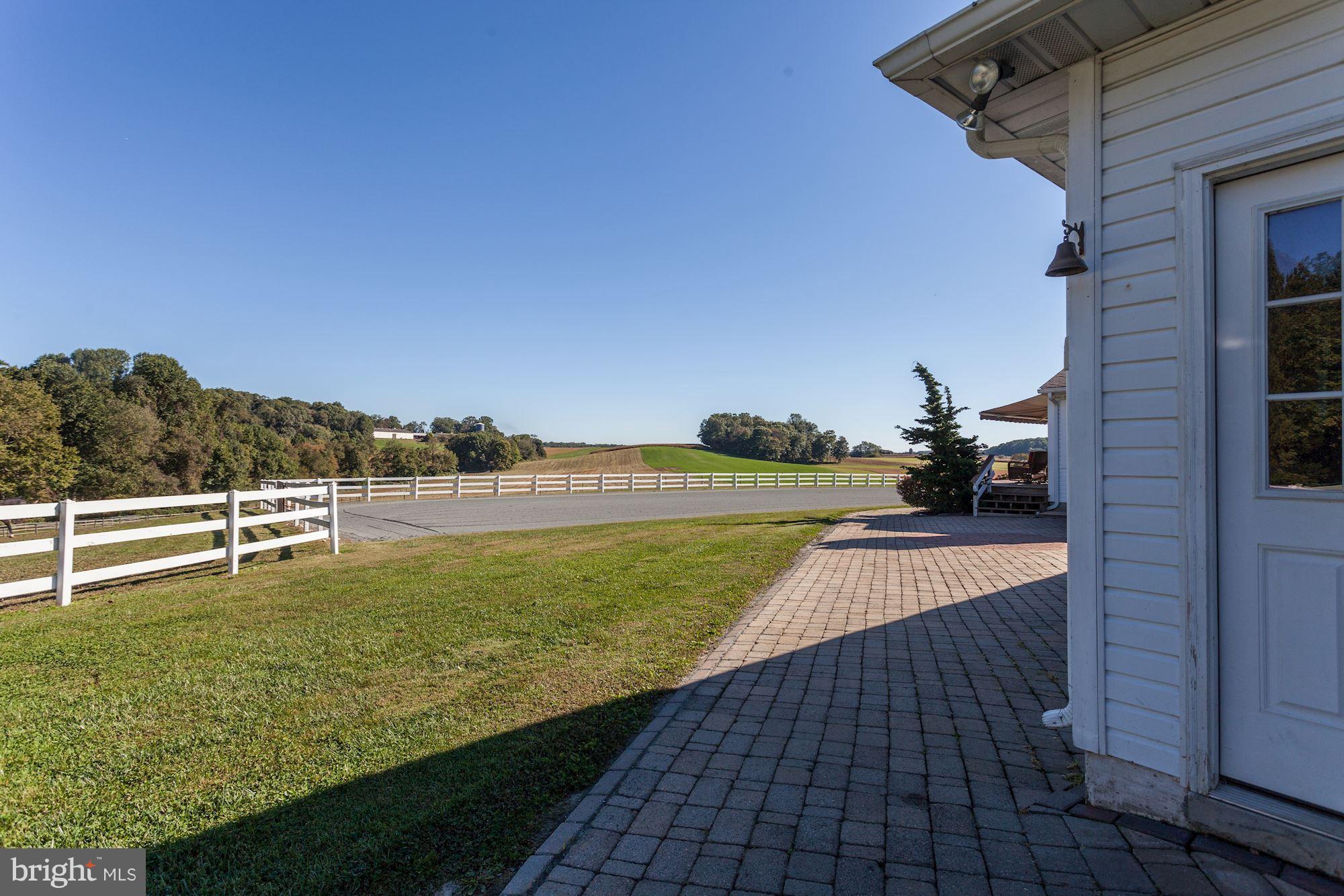 3517 Burkins Road Street, MD 21154 - Photo 22 of 30 STONE PATIO SURROUNDING HOME