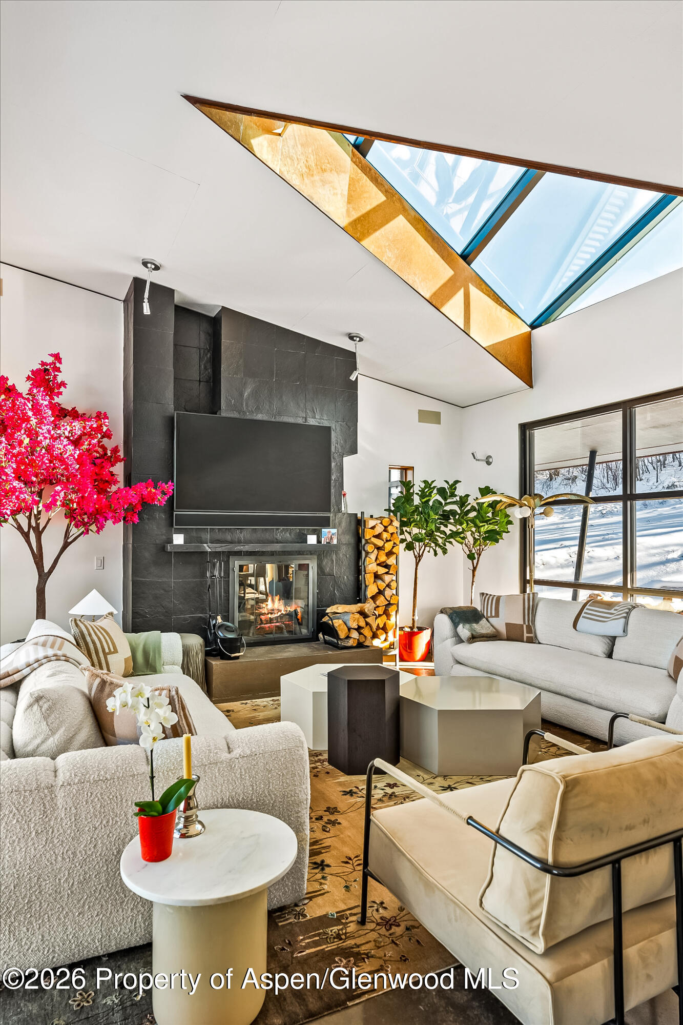 2700 Juniper Hill Road Aspen, CO 81611 - Photo 13 of 39 a living room with furniture and flowers