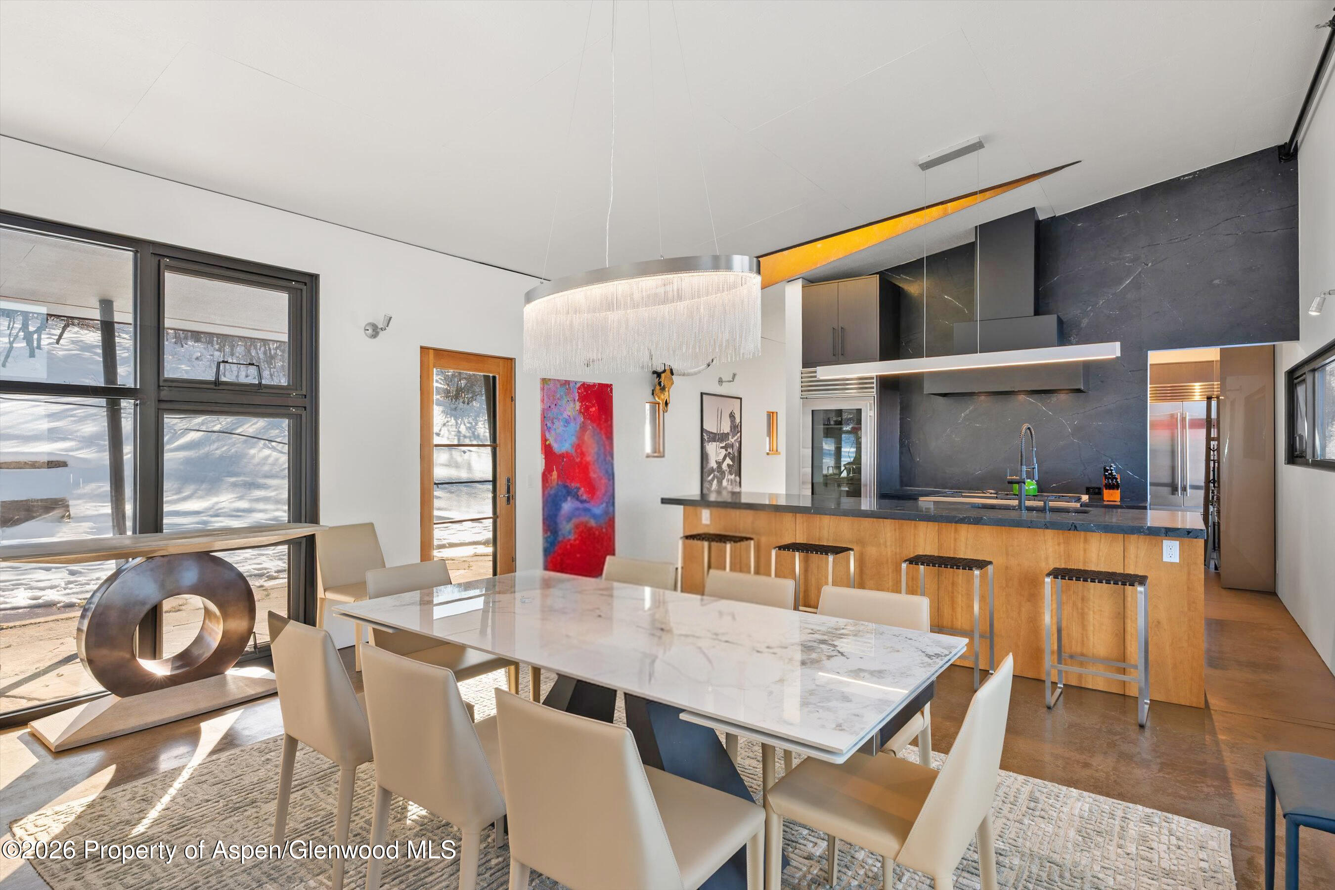 2700 Juniper Hill Road Aspen, CO 81611 - Photo 15 of 39 a dining room with furniture and window
