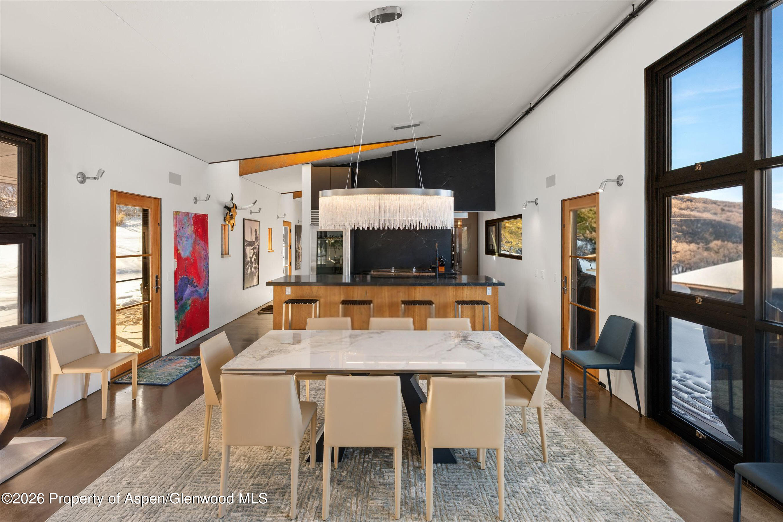 2700 Juniper Hill Road Aspen, CO 81611 - Photo 16 of 39 a dining room with furniture and window