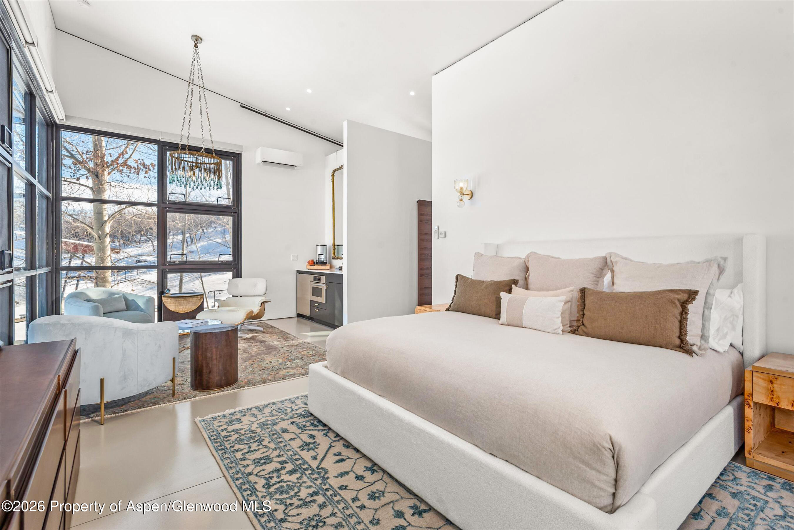 2700 Juniper Hill Road Aspen, CO 81611 - Photo 21 of 39 a bed room with a bed and a large window