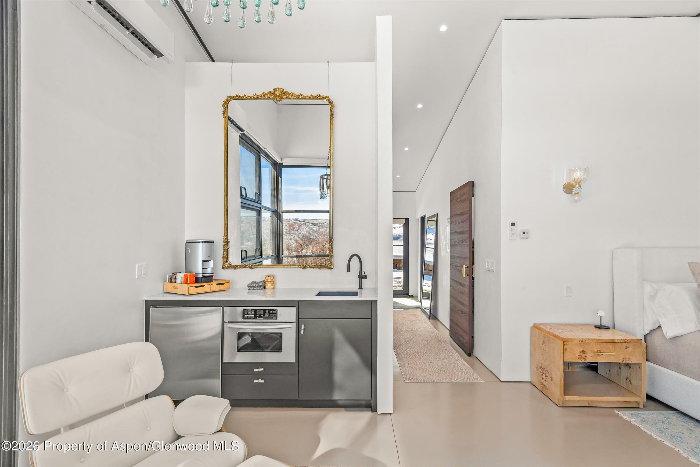 2700 Juniper Hill Road Aspen, CO 81611 - Photo 23 of 39 a room with a sink and a mirror