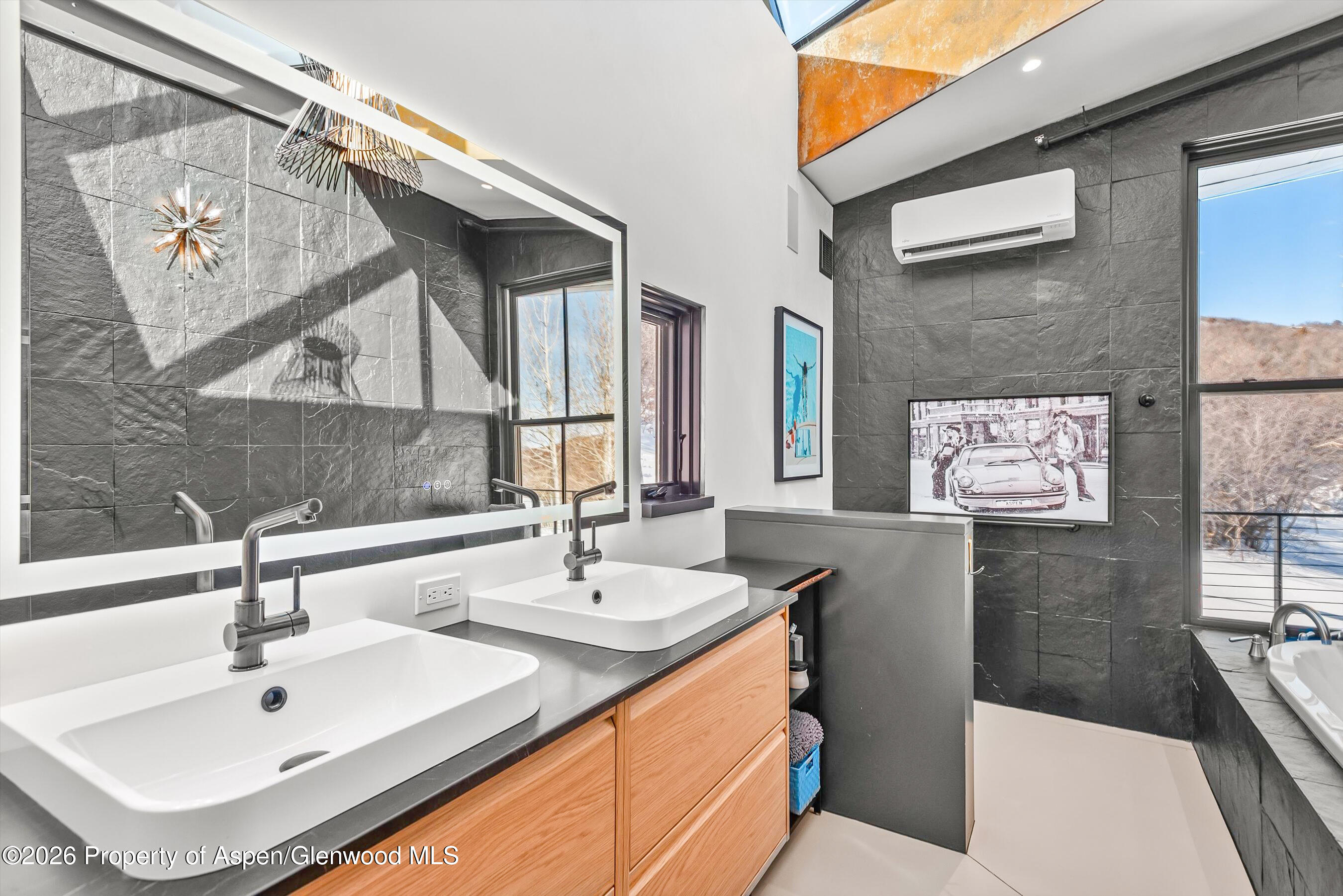 2700 Juniper Hill Road Aspen, CO 81611 - Photo 24 of 39 a bathroom with a sink and a bathtub