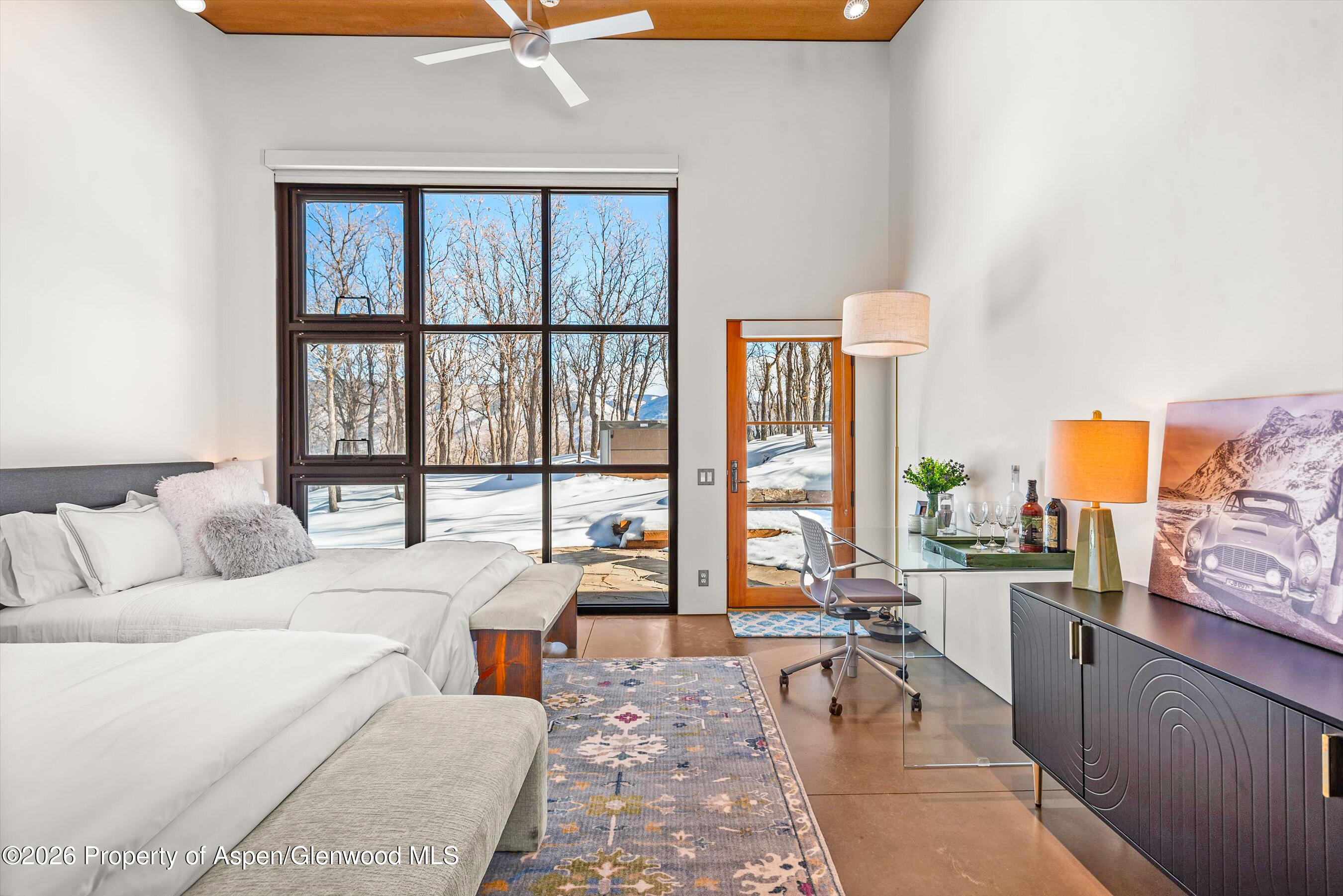 2700 Juniper Hill Road Aspen, CO 81611 - Photo 27 of 39 a living room with furniture and a large window