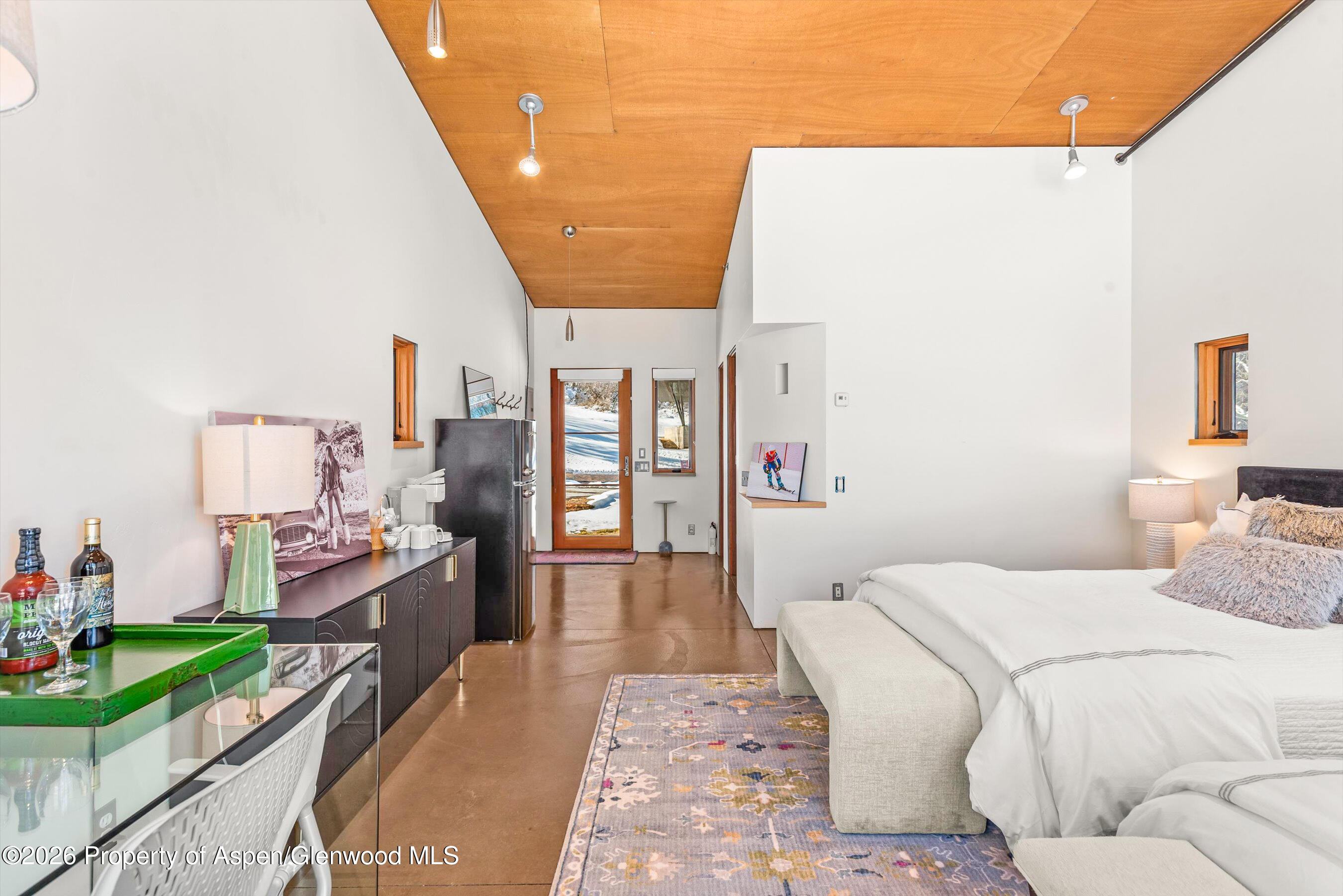 2700 Juniper Hill Road Aspen, CO 81611 - Photo 29 of 39 a bedroom with a bed and a couch