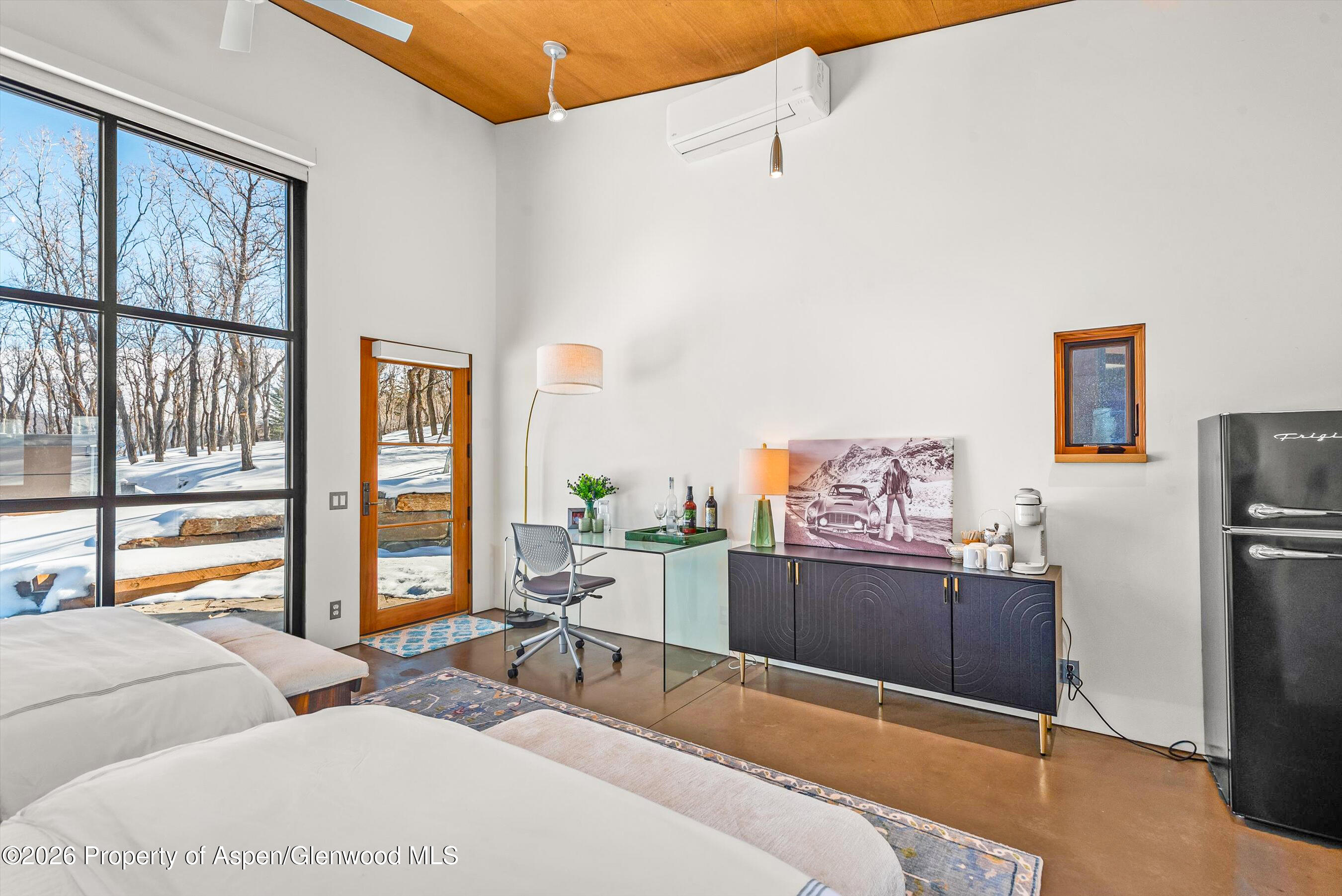 2700 Juniper Hill Road Aspen, CO 81611 - Photo 30 of 39 a bedroom with furniture and a window