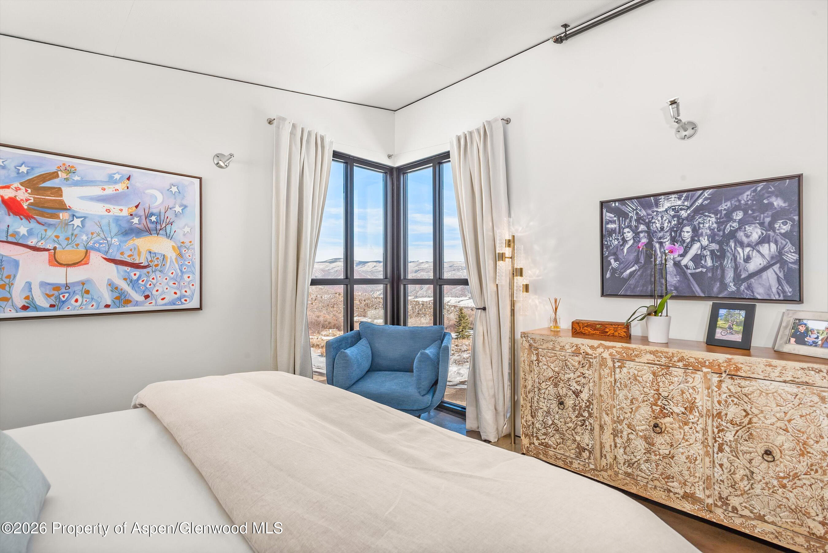 2700 Juniper Hill Road Aspen, CO 81611 - Photo 32 of 39 a bedroom with a bed and a couch