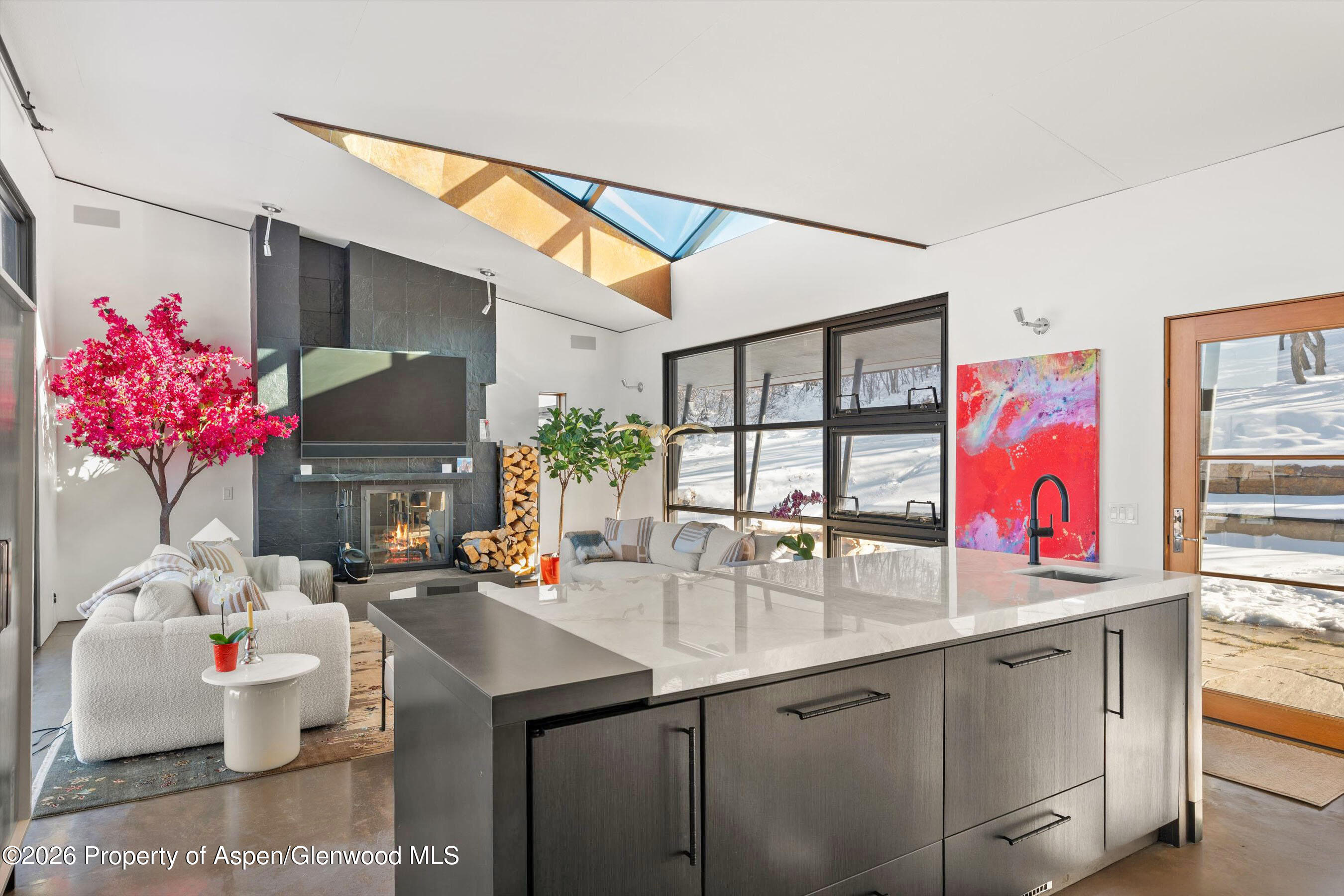 2700 Juniper Hill Road Aspen, CO 81611 - Photo 8 of 39 a very nice looking room with a large window