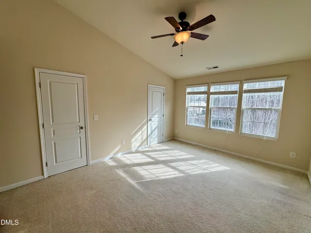 a view of a livingroom with a staircase