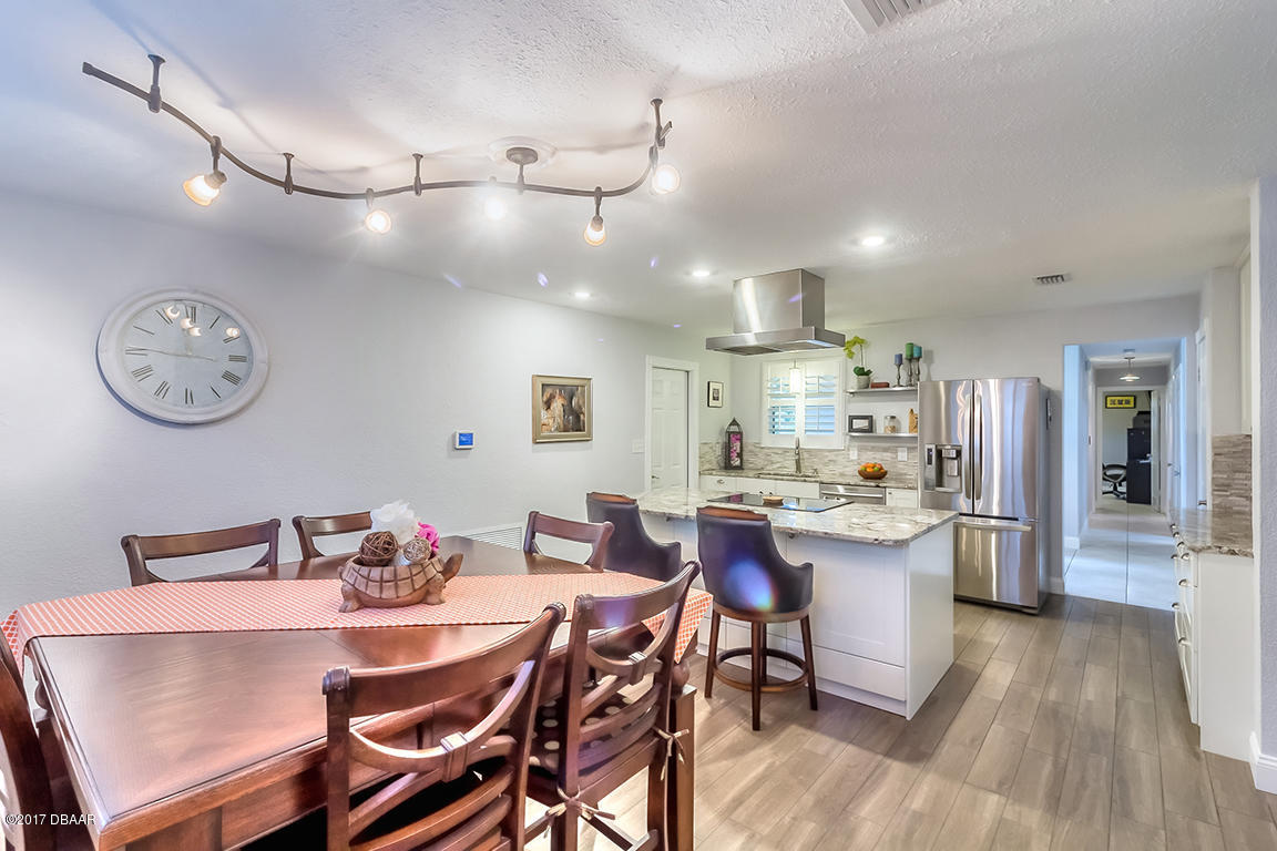 905 Pineapple Road South Daytona, FL 32119 - Photo 8 of 33 Tiled Dining Area