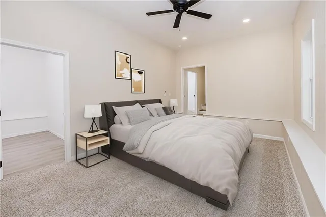 a bedroom with a bed and a cabinets