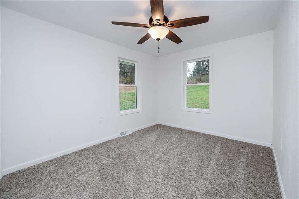 733 Metz Road Indiana, PA 15701 - Photo 24 of 42 an empty room with windows and fan