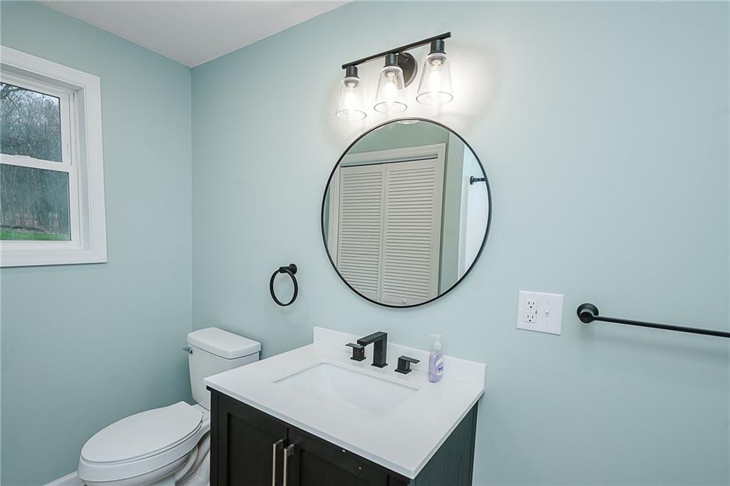 733 Metz Road Indiana, PA 15701 - Photo 29 of 42 a bathroom with a sink a toilet and a mirror