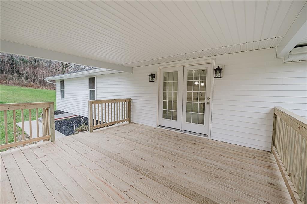 733 Metz Road Indiana, PA 15701 - Photo 33 of 42 a view of backyard with a deck and wooden floor