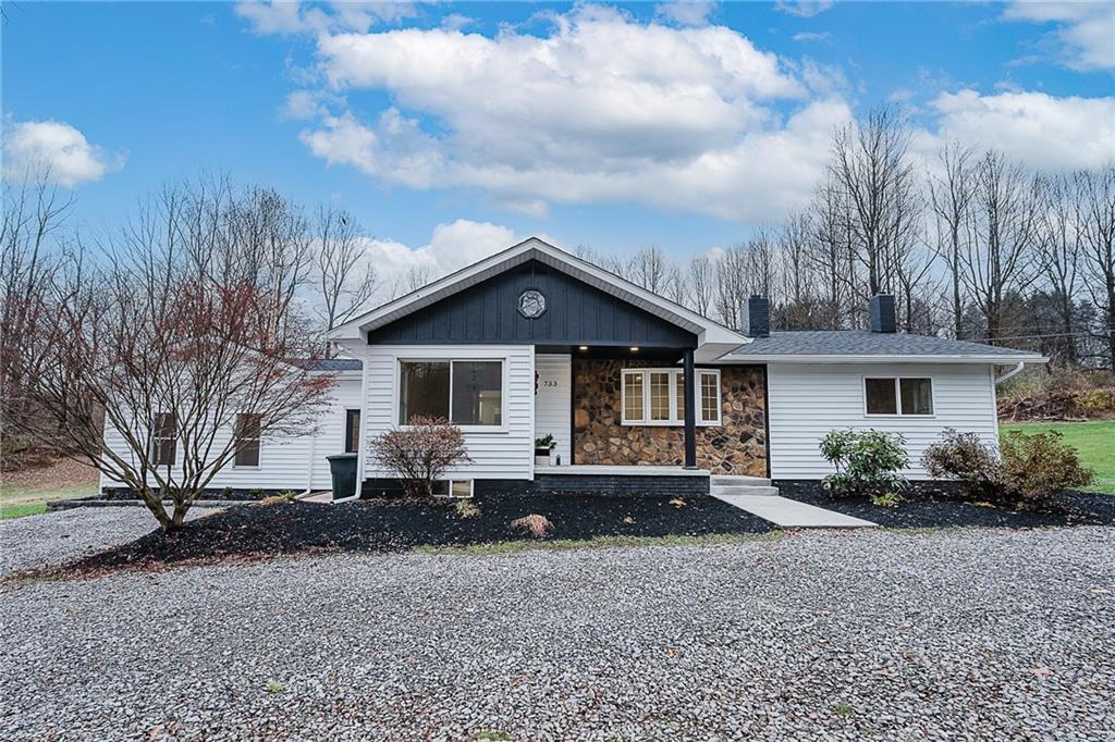 733 Metz Road Indiana, PA 15701 - Photo 36 of 42 a front view of a house with a yard and trees