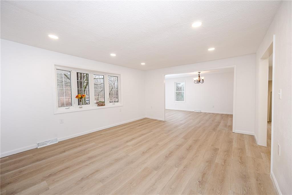 733 Metz Road Indiana, PA 15701 - Photo 4 of 42 a view of empty room with wooden floor and fan