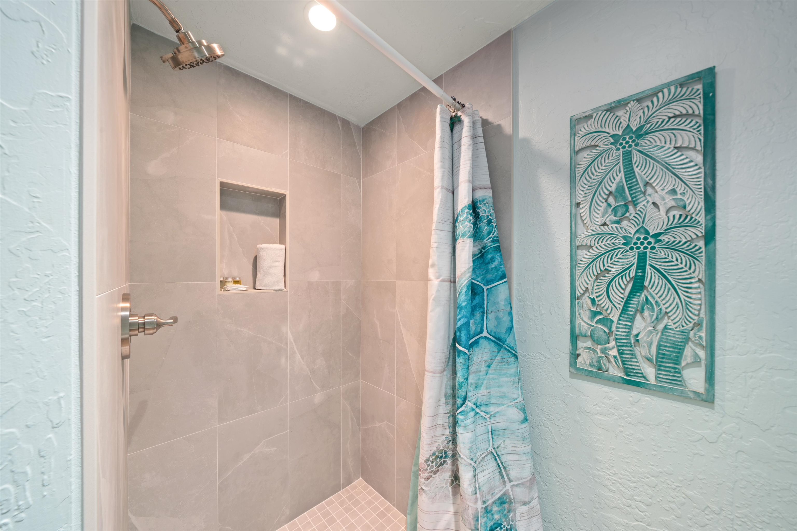 3543 Lower Honoapiilani Road, Unit G103 Lahaina, HI 96761 - Photo 25 of 47 a bathroom with a bathtub and shower