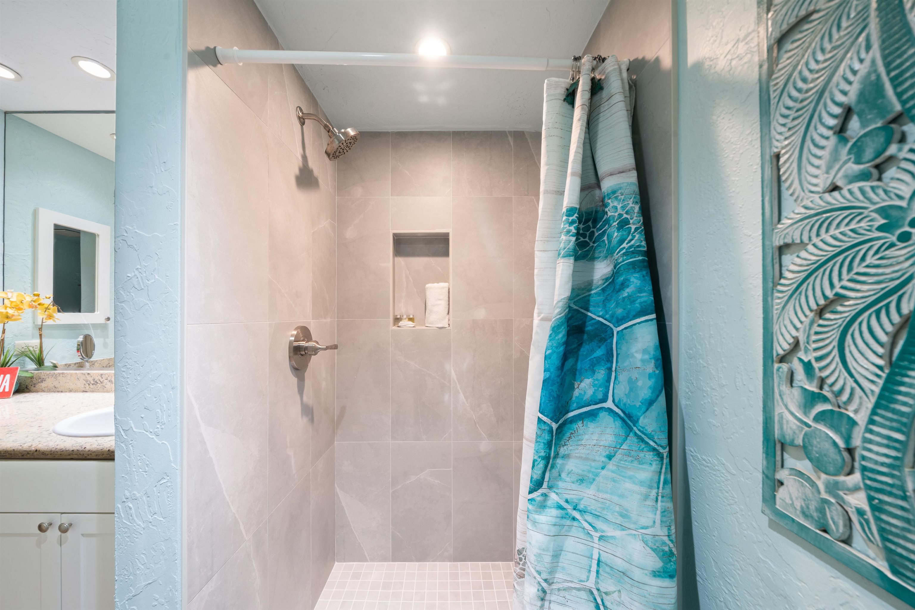 3543 Lower Honoapiilani Road, Unit G103 Lahaina, HI 96761 - Photo 26 of 47 a bathroom with a bathtub and shower