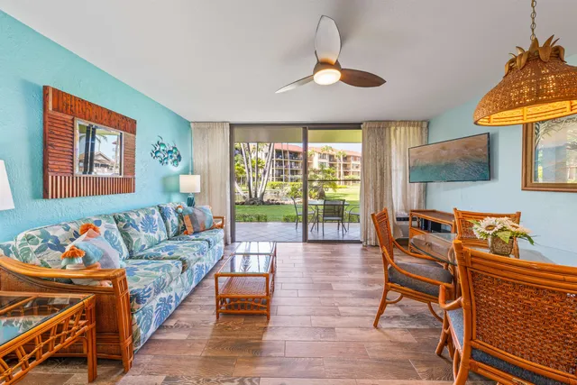 a view of a table and chairs in the patio