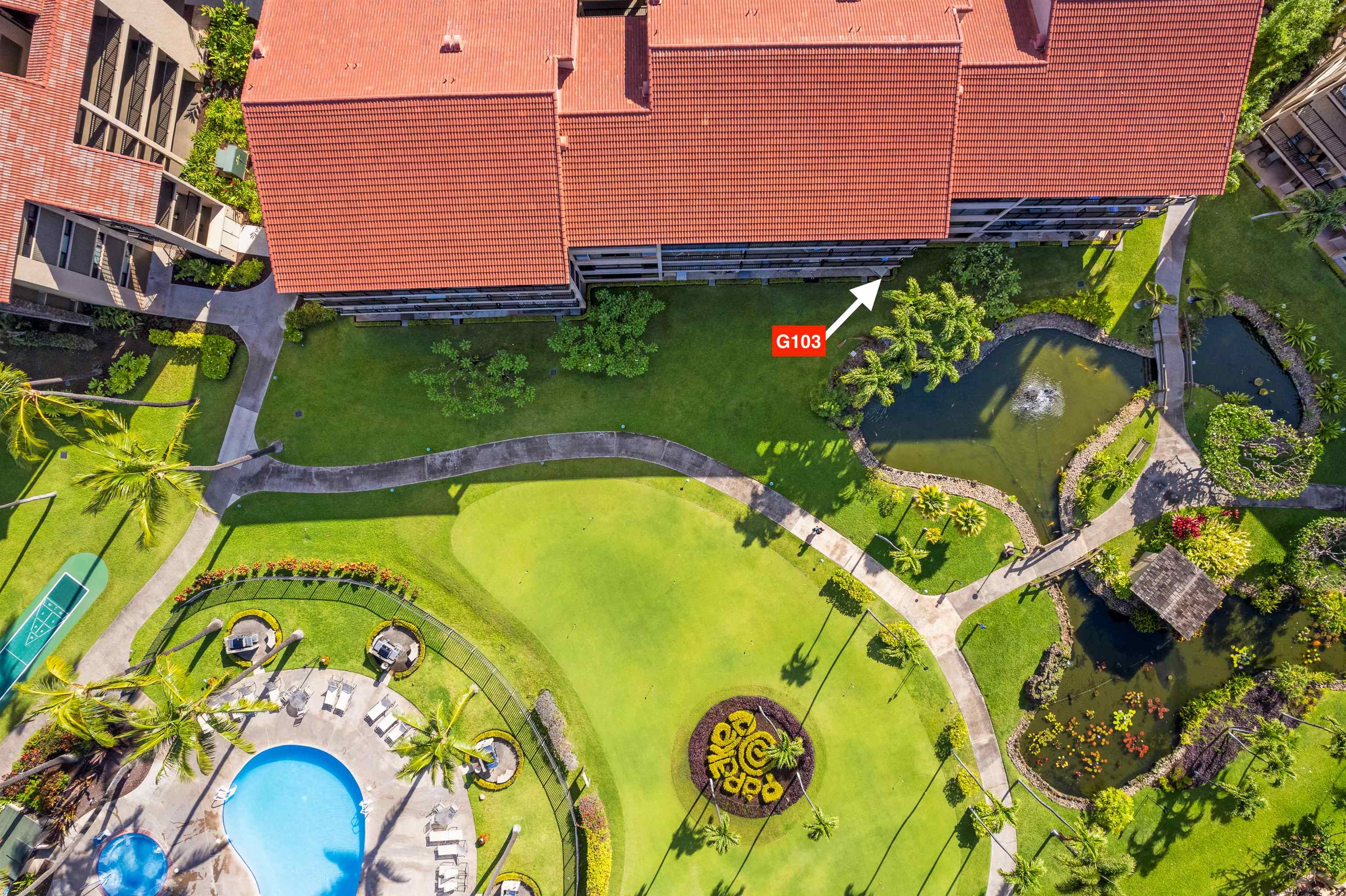 3543 Lower Honoapiilani Road, Unit G103 Lahaina, HI 96761 - Photo 42 of 47 a view of swimming pool with a garden