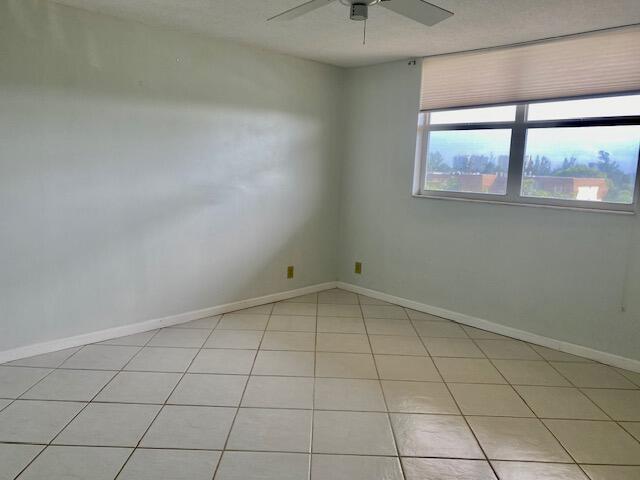 6161 Northwest 2nd Avenue, Unit FOUR Boca Raton, FL 33487 - Photo 19 of 50 an empty room with a empty space and window