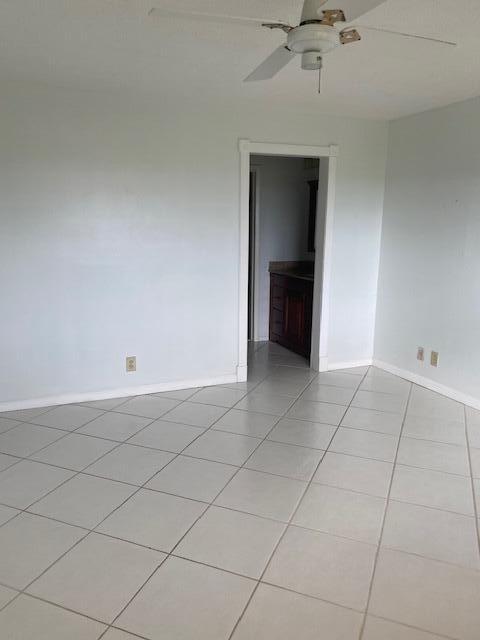 6161 Northwest 2nd Avenue, Unit FOUR Boca Raton, FL 33487 - Photo 20 of 50 a view of an empty room with a window