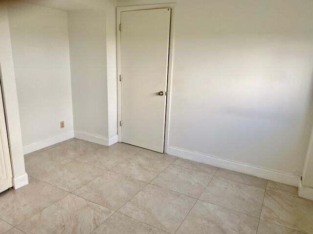 6161 Northwest 2nd Avenue, Unit FOUR Boca Raton, FL 33487 - Photo 29 of 50 an empty room with closet
