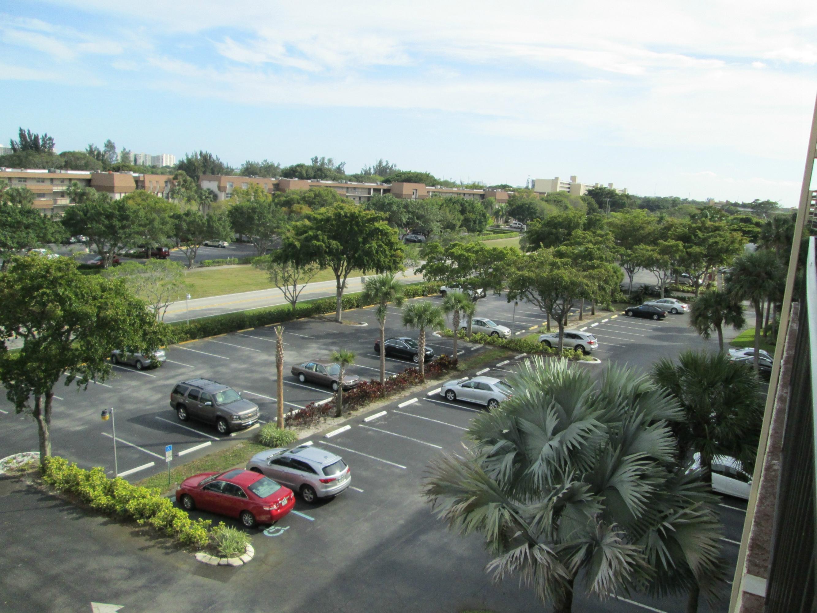 6161 Northwest 2nd Avenue, Unit FOUR Boca Raton, FL 33487 - Photo 3 of 50 a view of a lake with outdoor space
