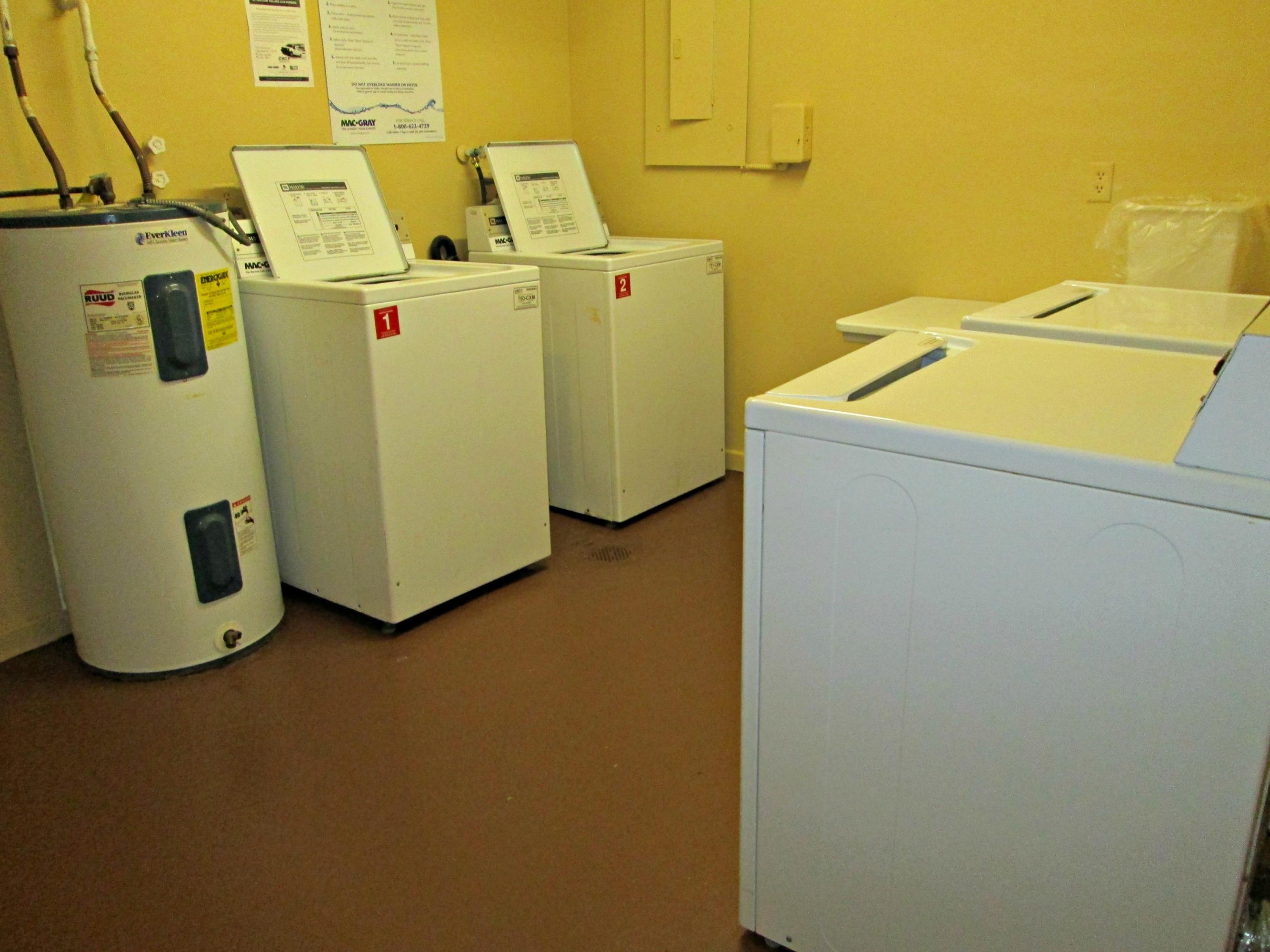 6161 Northwest 2nd Avenue, Unit FOUR Boca Raton, FL 33487 - Photo 35 of 50 a utility room with dryer and washer