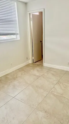 a front view of a house with balcony
