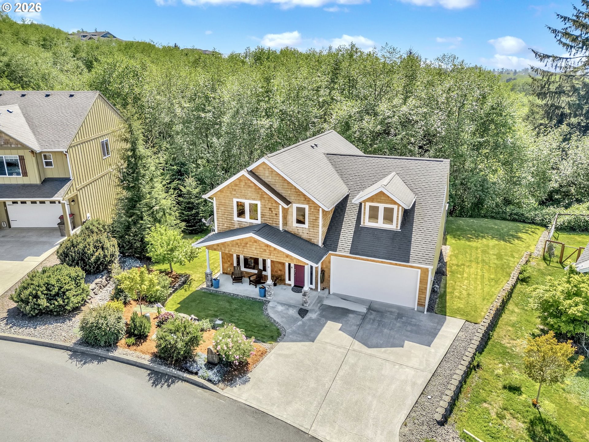 2372 North Fork Road Seaside, OR 97138 - Photo 3 of 48 an aerial view of a house with a garden