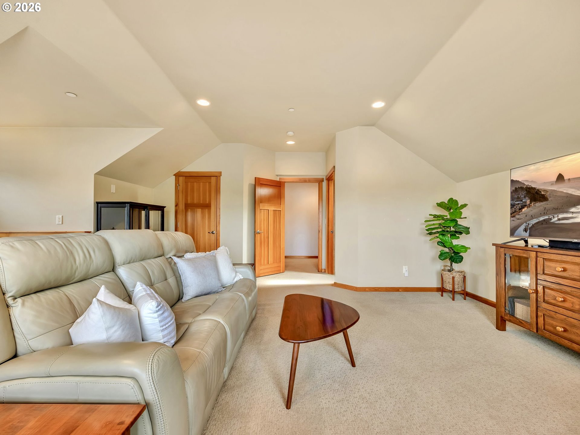 2372 North Fork Road Seaside, OR 97138 - Photo 32 of 48 a living room with furniture and a flat screen tv