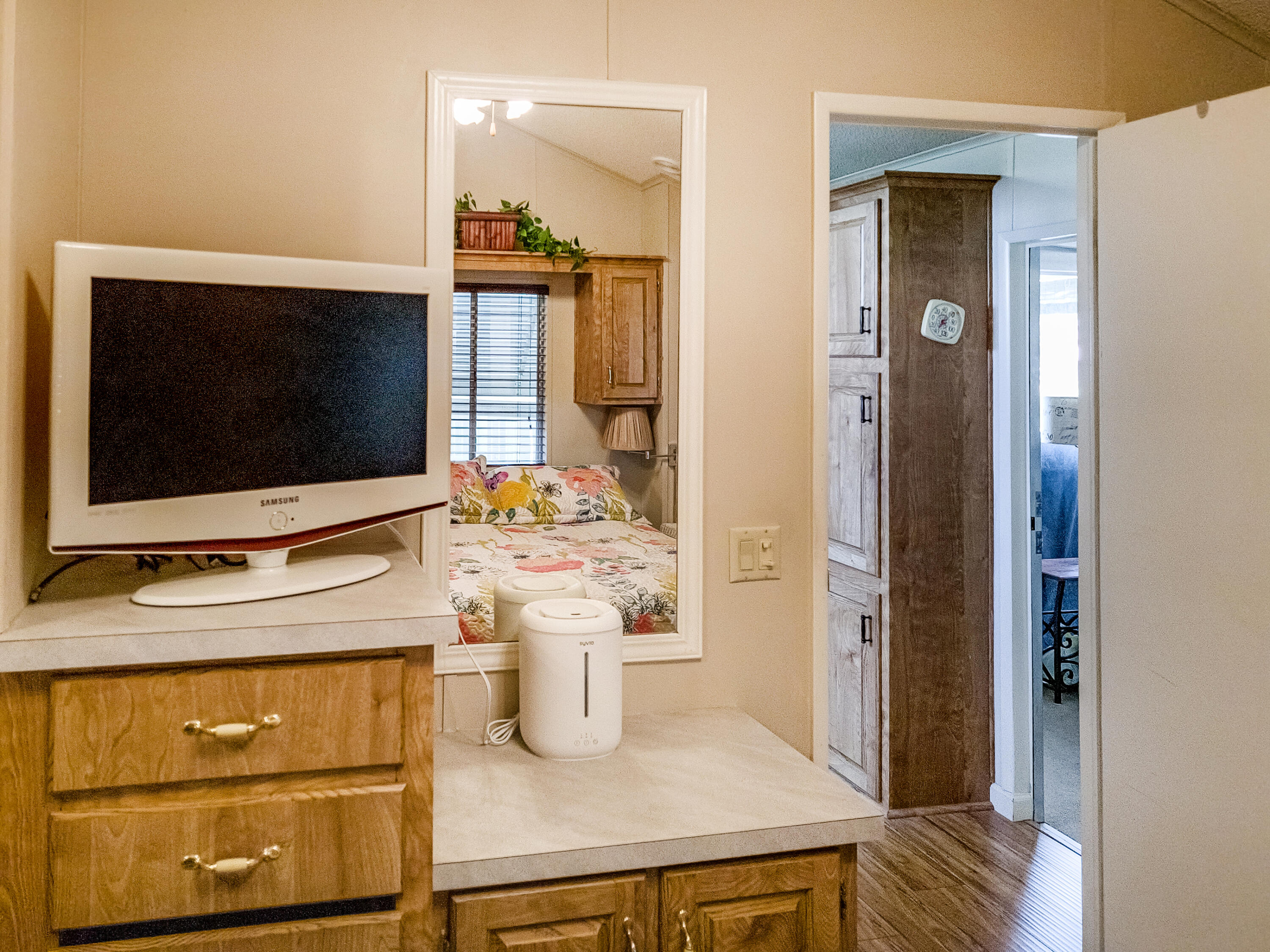 70200 Dillon Road, Unit 160 Desert Hot Springs, CA 92241 - Photo 13 of 31 a living room with flat screen tv and outdoor view