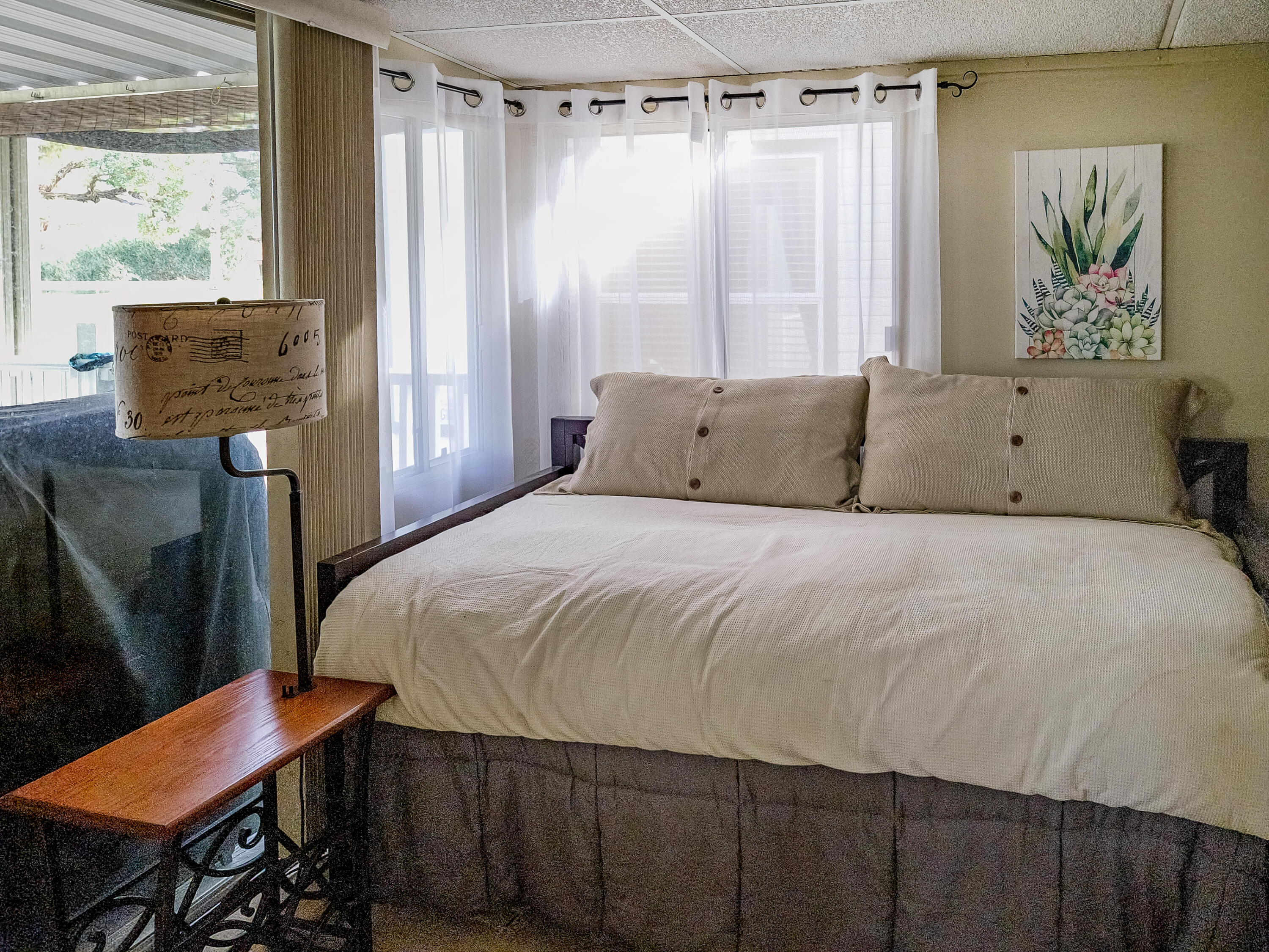 70200 Dillon Road, Unit 160 Desert Hot Springs, CA 92241 - Photo 16 of 31 a bedroom with a bed and a window