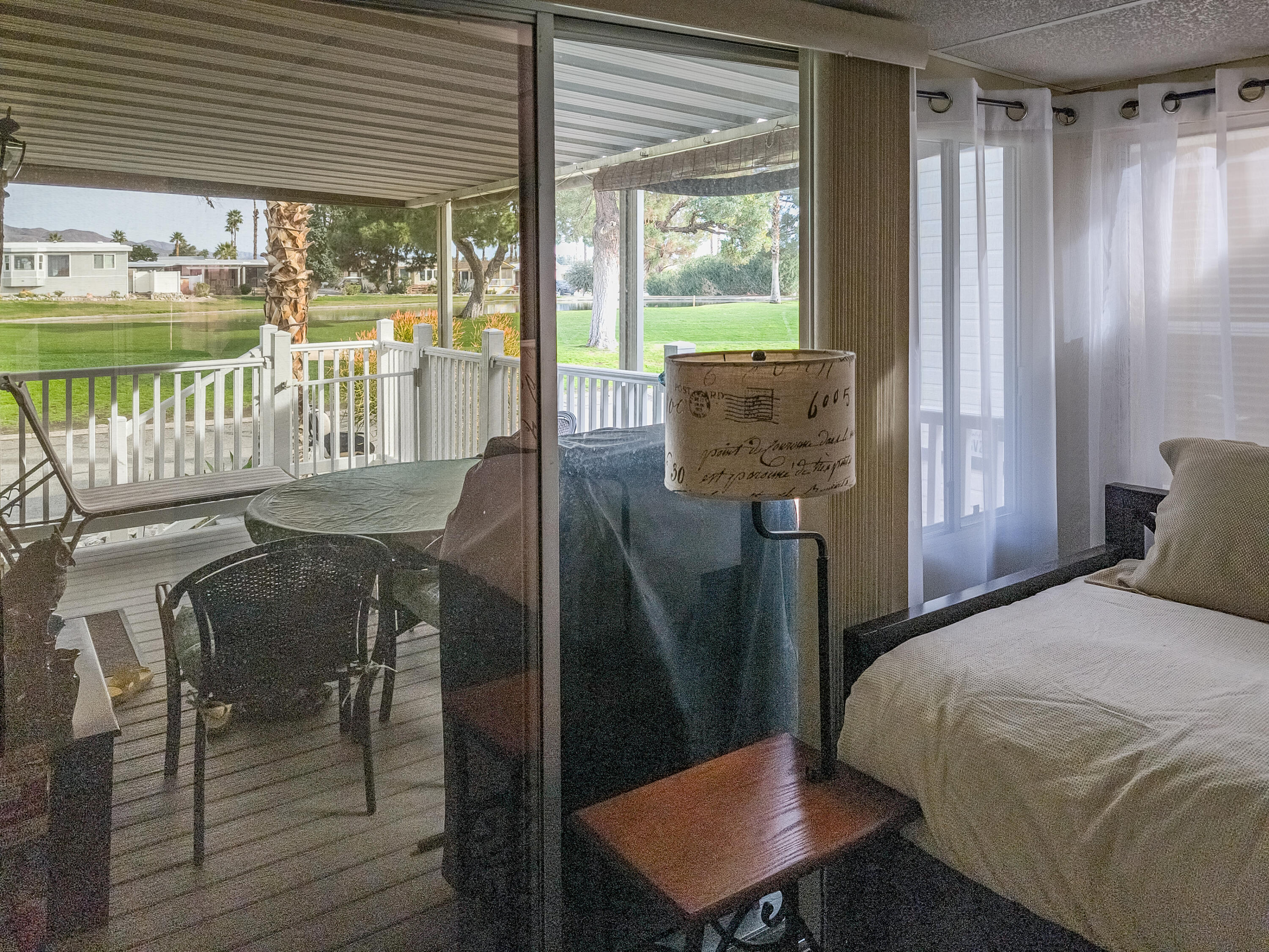 70200 Dillon Road, Unit 160 Desert Hot Springs, CA 92241 - Photo 17 of 31 a view of a dining room with furniture window and outside view