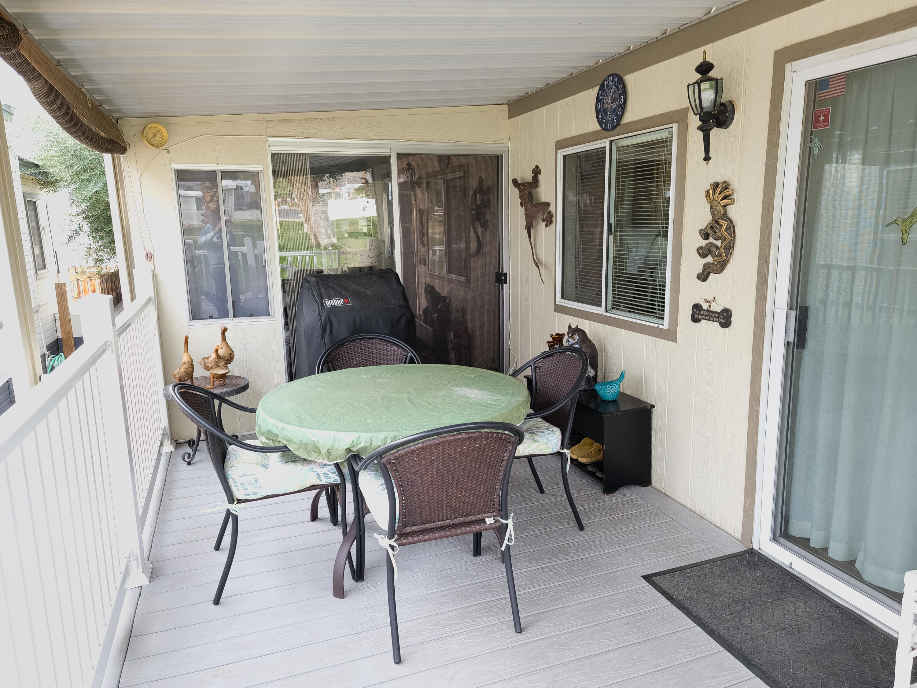 70200 Dillon Road, Unit 160 Desert Hot Springs, CA 92241 - Photo 18 of 31 a view of a dining room with furniture and a window