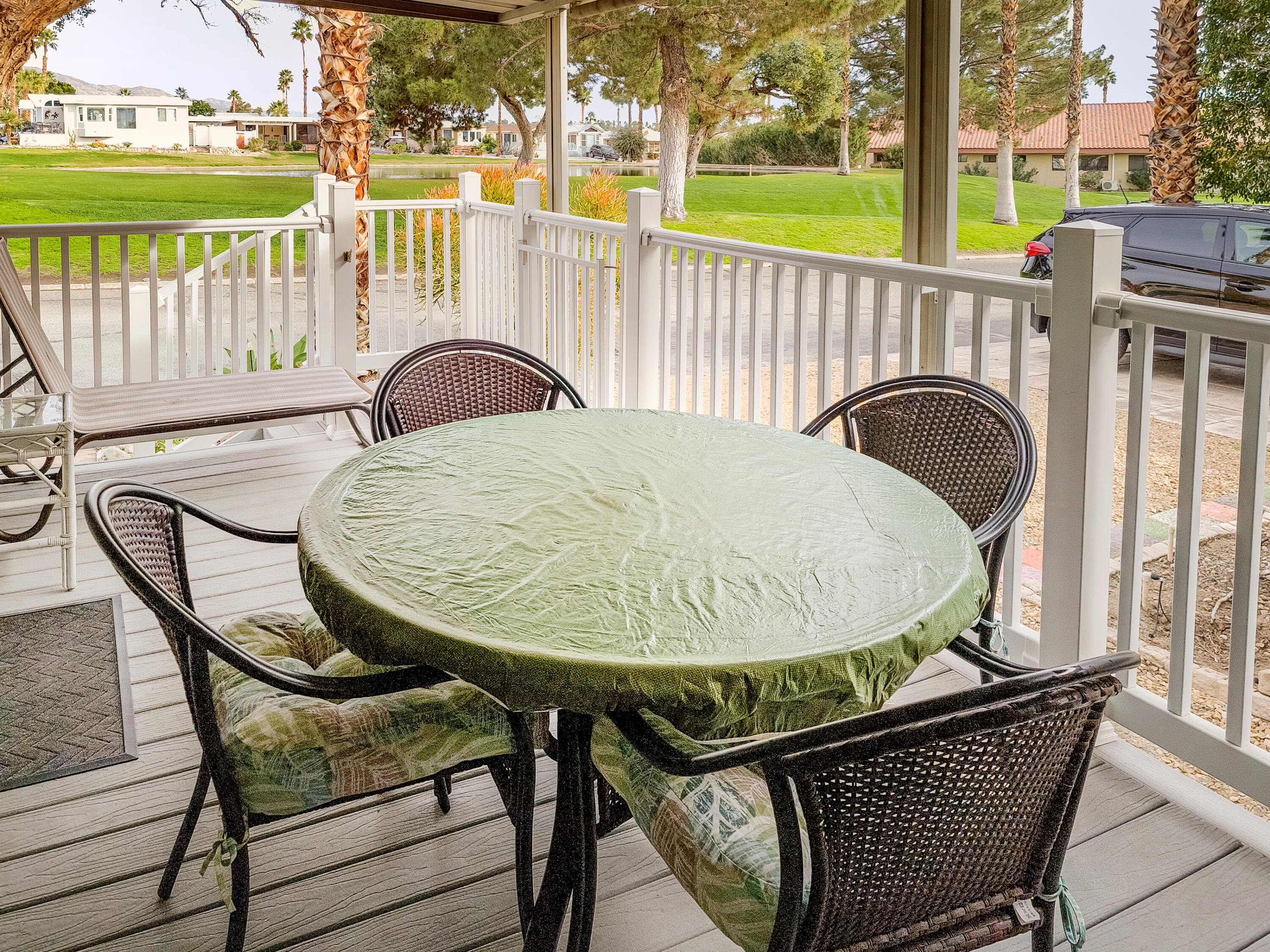 70200 Dillon Road, Unit 160 Desert Hot Springs, CA 92241 - Photo 19 of 31 a view of a chairs and table in patio