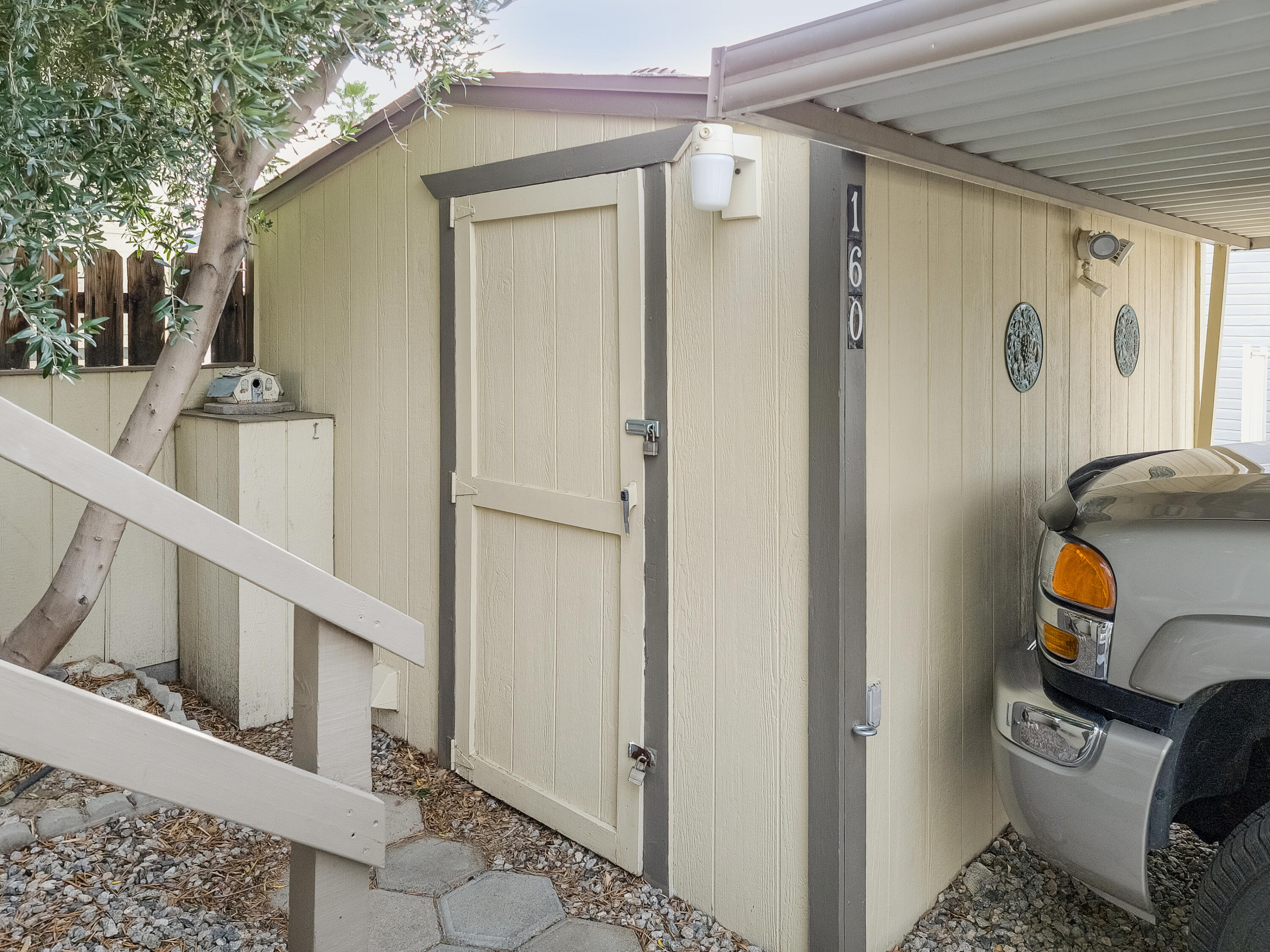 70200 Dillon Road, Unit 160 Desert Hot Springs, CA 92241 - Photo 22 of 31 a view of a door and car parked in a room