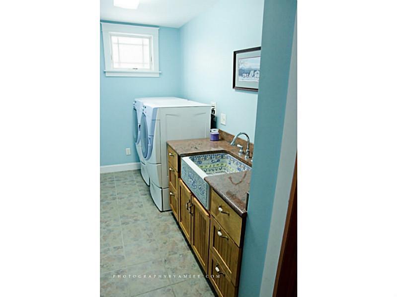 128 Pond Road New Gloucester, ME 04260 - Photo 9 of 33 Other. Laundry room with storage and...