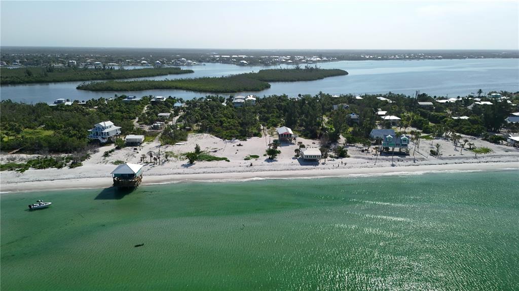 8156 Little Gasparilla Boca Grande, FL 33921 - Photo 21 of 25 a view of a lake with outdoor space